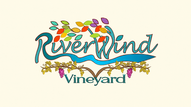 Colorful logo for RiverWind Vineyard featuring stylized grapes and vibrant leaves