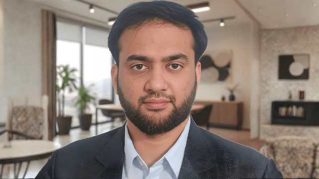Portrait of Mohammed Afzal Khan, a Senior Software Engineer specializing in AI and workflow systems, in a modern office.