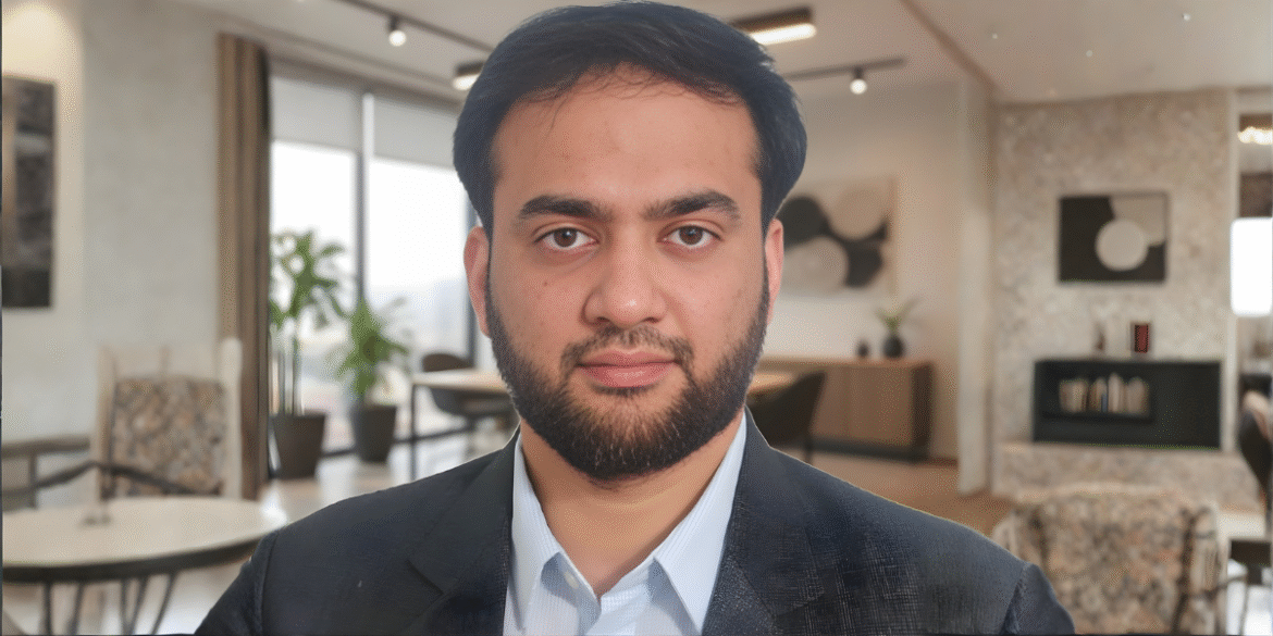 Portrait of Mohammed Afzal Khan, a Senior Software Engineer specializing in AI and workflow systems, in a modern office.